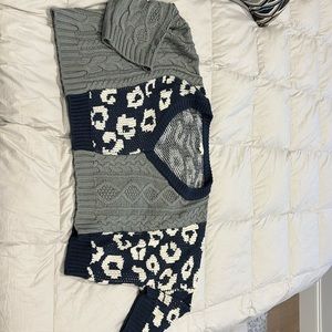 Multi pattern deep V sweater